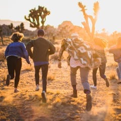 people running down a field